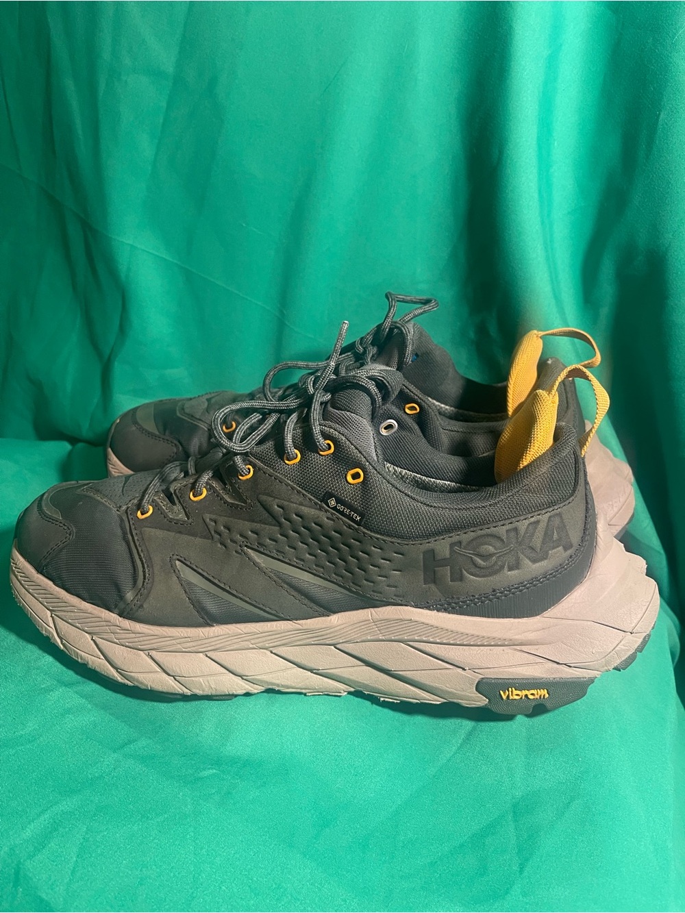 Hoka Men's Black Athletic Sneakers with Yellow Accents